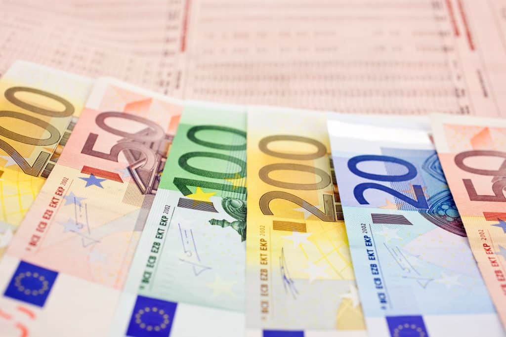 euro notes on a financial newspaper