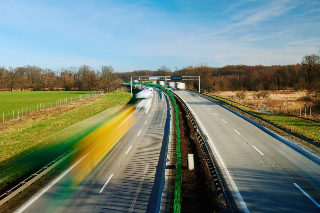 Traffic on motorway with motion blurred cars