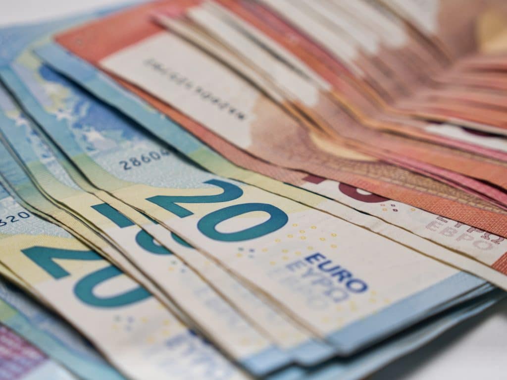Closeup shot of a pile of ten and twenty Euro banknotes
