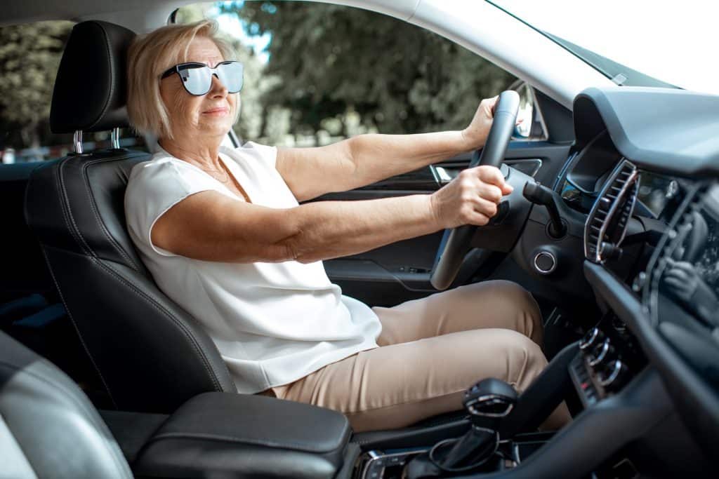 Senior woman driving a car