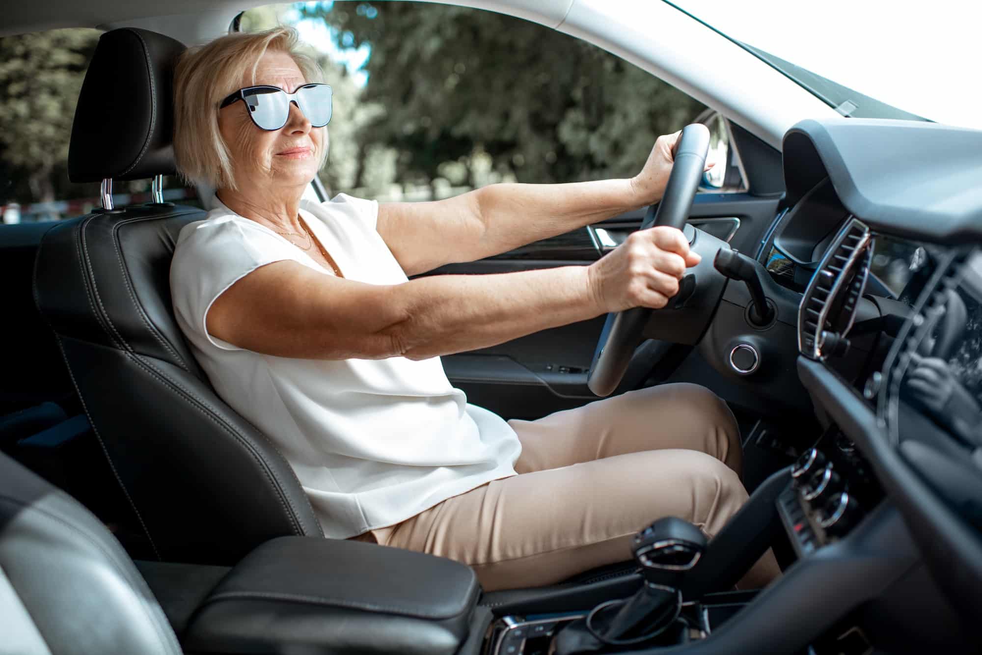 Senior woman driving a car