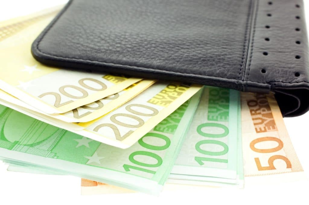 black leather wallet with euro notes