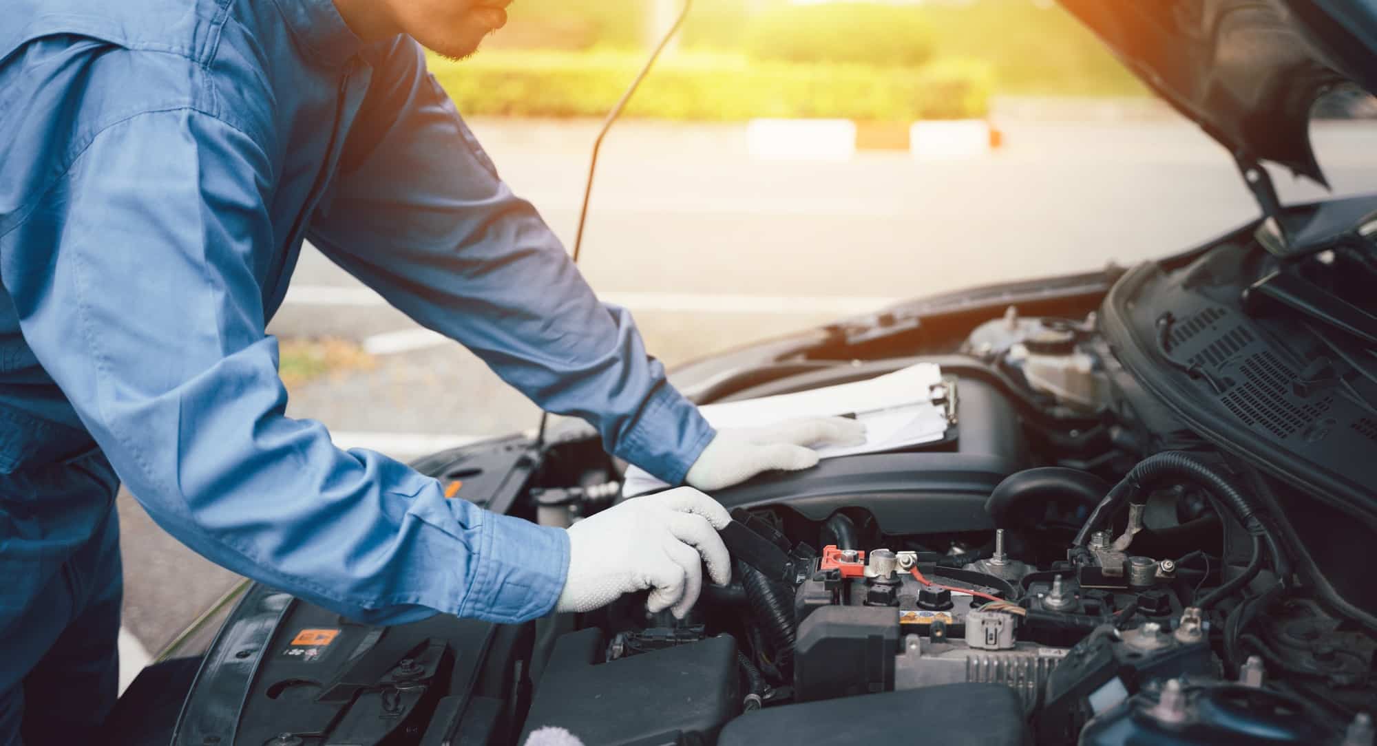 Mechanic repairing car